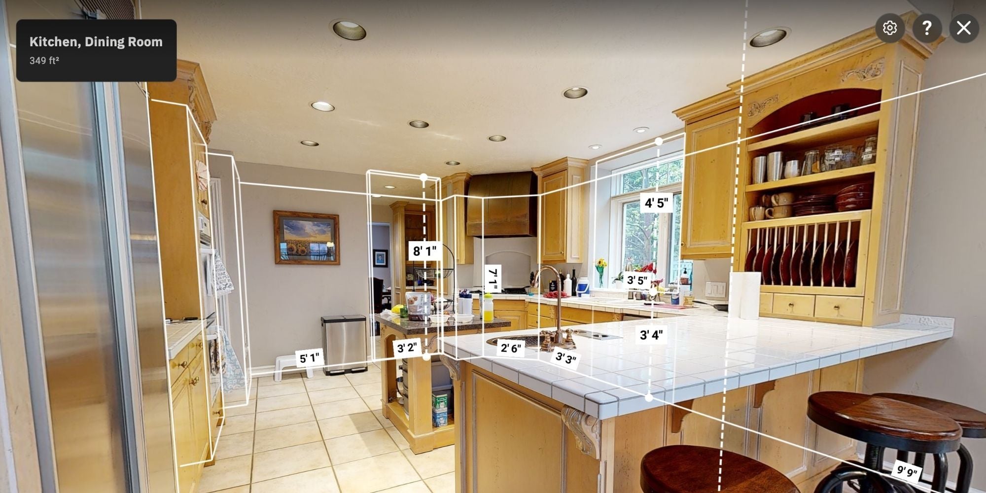 Matterport screenshot showing measurements of a kitchen and dining area by Marshall Homes