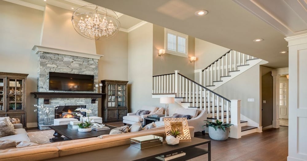 Spacious Salt Lake City living room addition with stone fireplace and stylish open layout