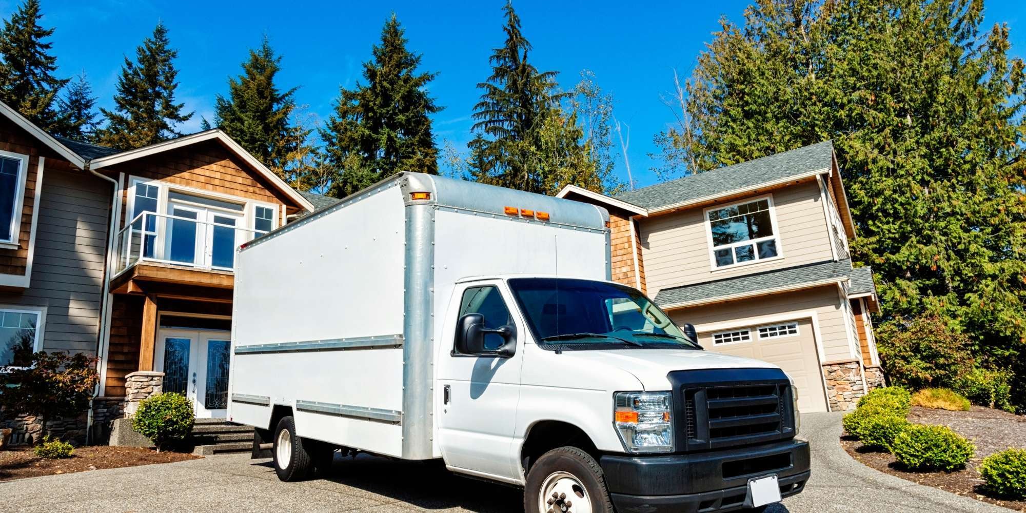 Moving van moving you into your new custom home by Marshall Homes Utah