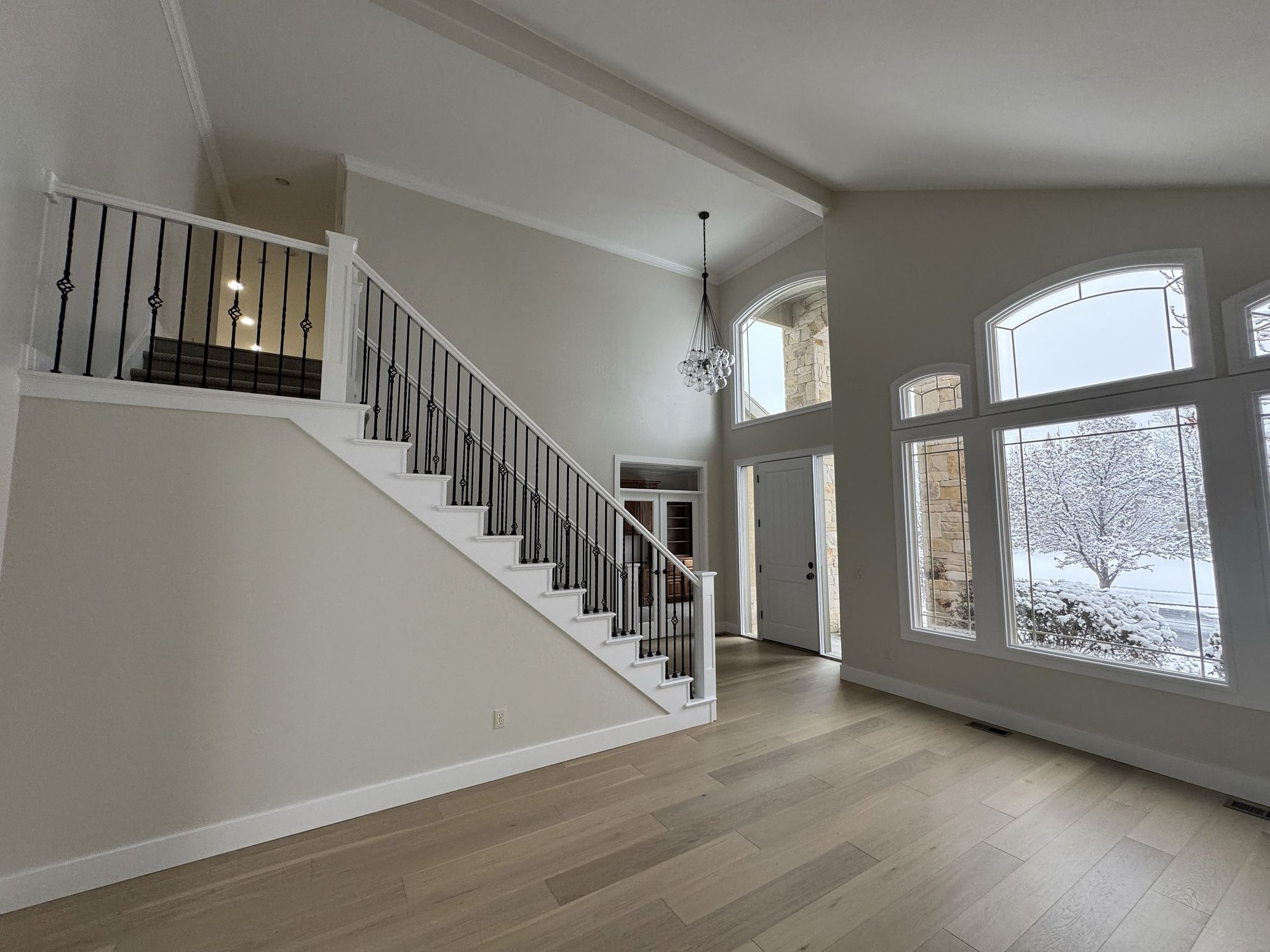 Front room of luxury custom home interior with staircase - Kitchen improvement process before image - Marshall Homes Utah Custom Builder Front room of luxury custom home interior with staircase - Kitchen improvement process before image - Marshall Homes Utah Custom Builder