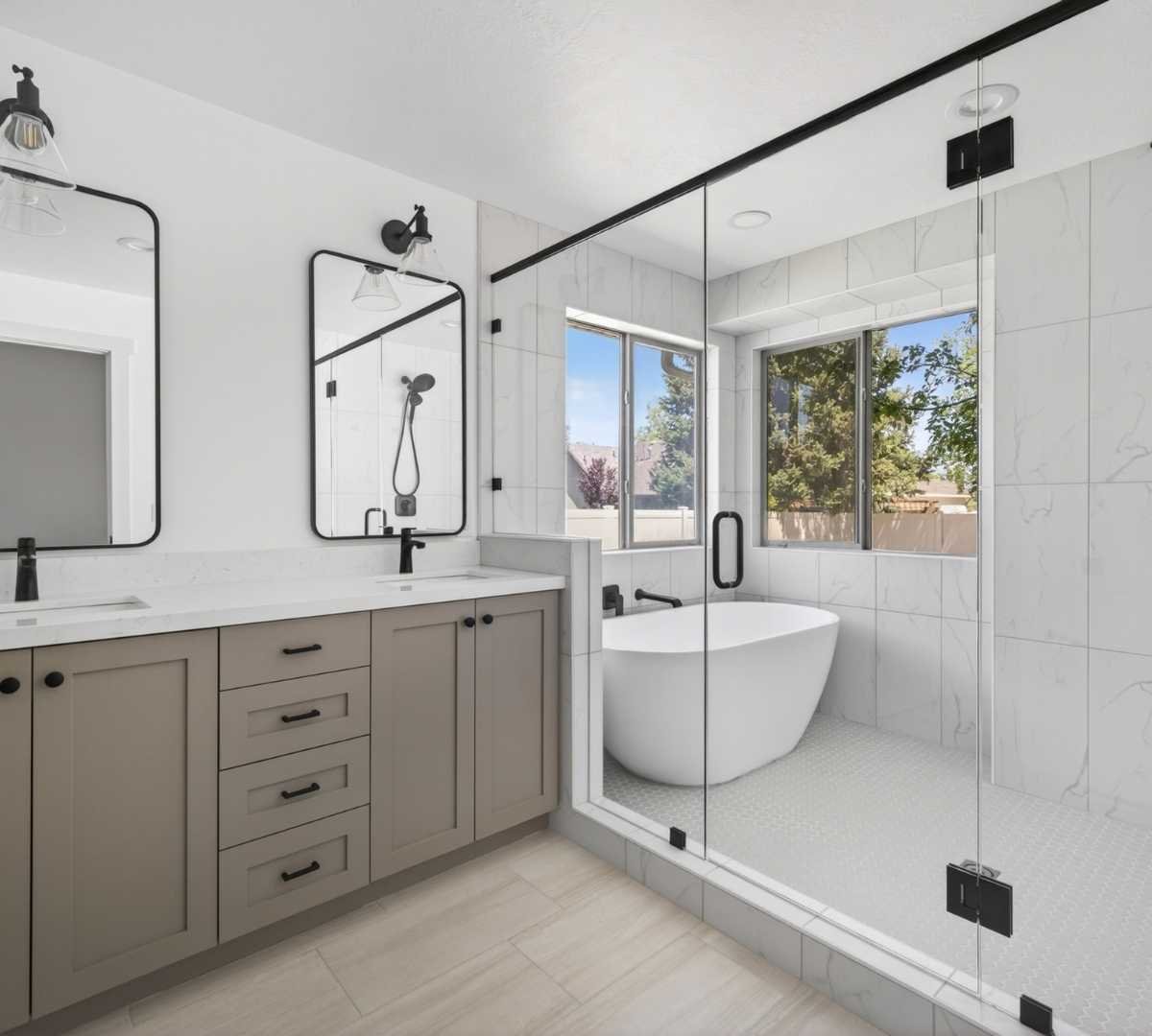 Image of luxury bathroom remodel with freestanding tub and glass shower by Marshall Homes in Herriman, UT