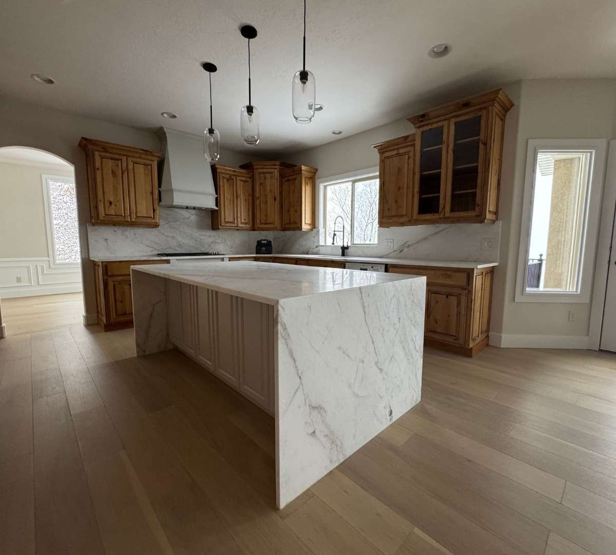 Open concept kitchen in a home remodel by Marshall Homes Utah in Salt Lake City