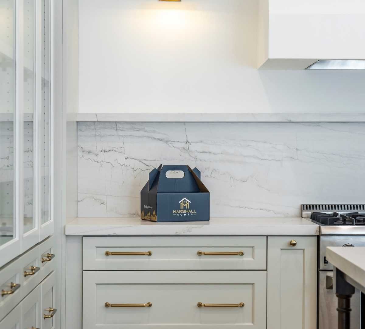 Custom counters and backsplash in a custom kitchen by Marshall Homes Utah in Salt Lake City