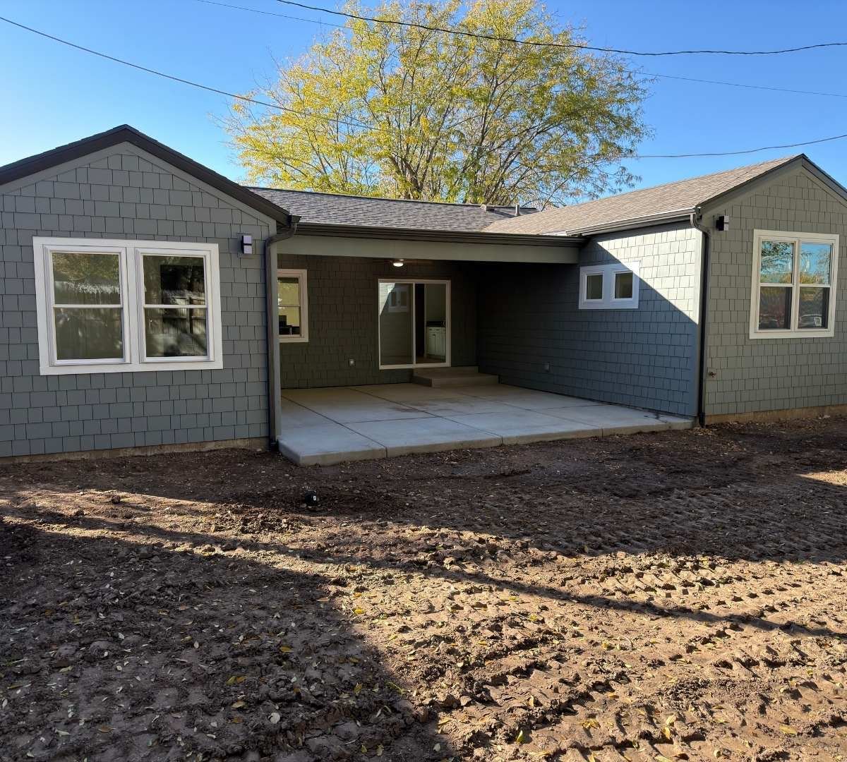 Exterior view of the back of a home addition by Marshall Homes Utah