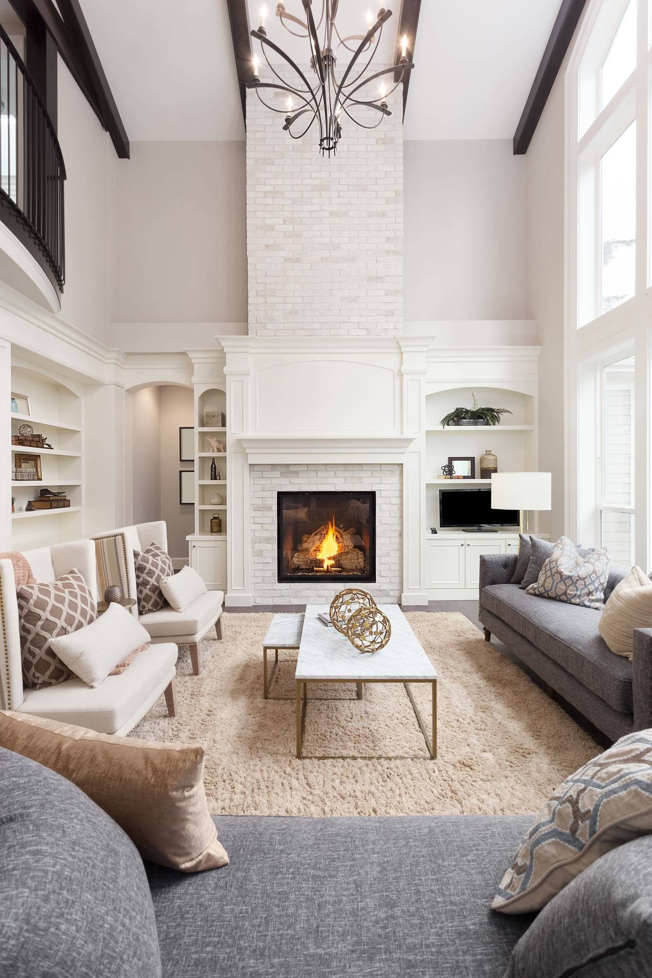Living Room Renovation with Fireplace wall and high Ceilings Utah Marshall Homes
