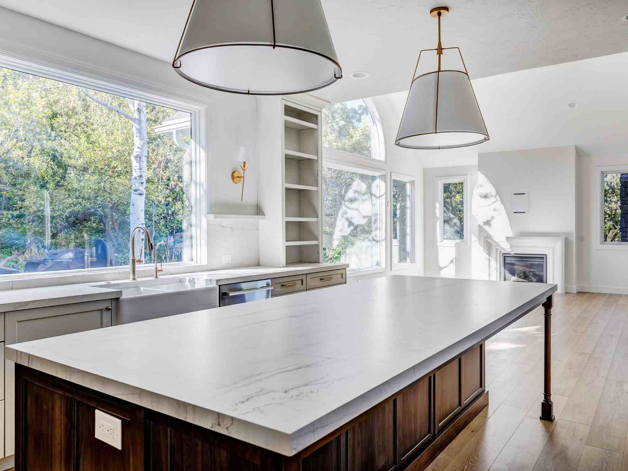 Marshall Homes kitchen remodel in Olympus Cove, Utah with large island, custom cabinetry, and open layout